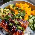 Teriyaki Lachs Reisschüssel mit Mango – Ein Genuss fürs Herz!